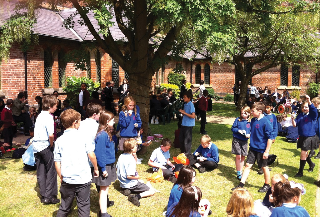 School children in monastery garden