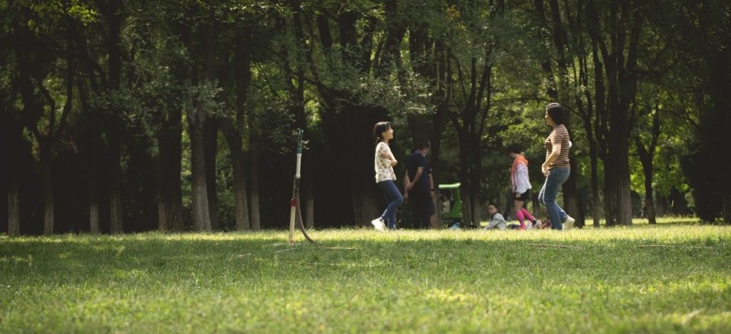 People enjoying parkland