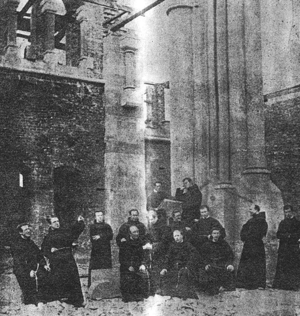 Friars looking at the construction of the church