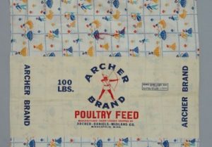 Poultry feed sack with design showing women in fashionable dresses